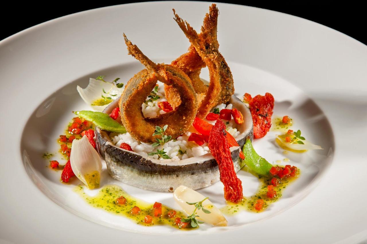 Palace Hotel Do Bussaco Luso  Exterior photo A dish of fried fish